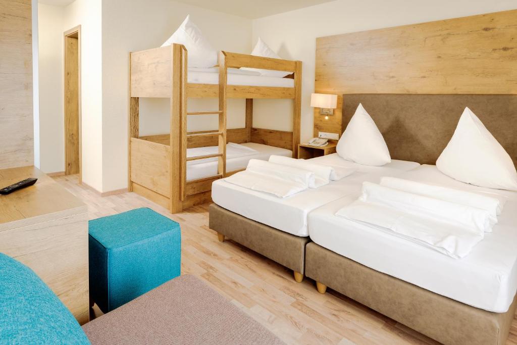 Postel nebo postele na pokoji v ubytování Hotel Mythos