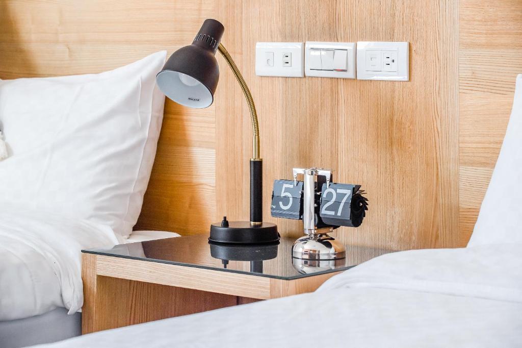 Postel nebo postele na pokoji v ubytování Penghu Sea Residences Hall