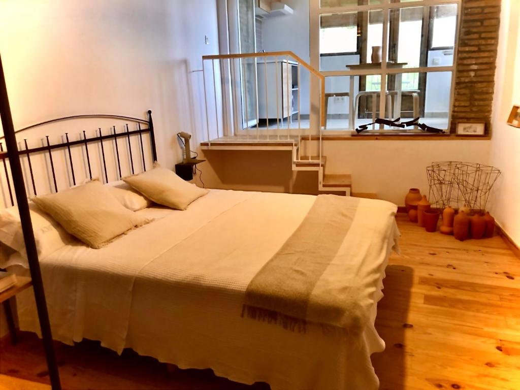 Postel nebo postele na pokoji v ubytování Casa Regacens