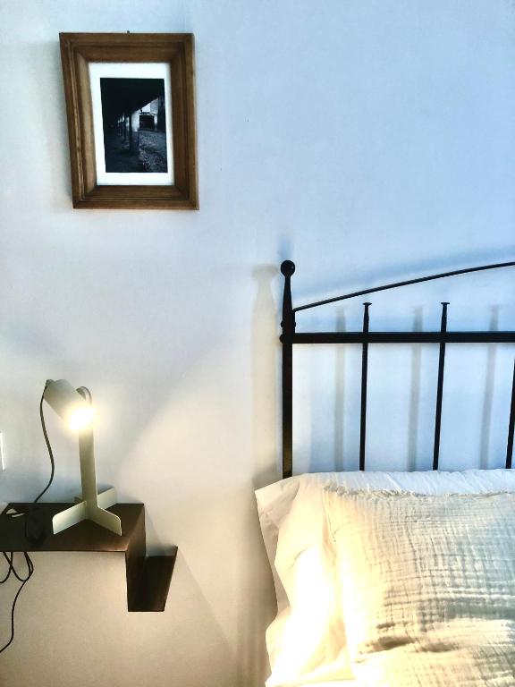 Postel nebo postele na pokoji v ubytování Casa Regacens