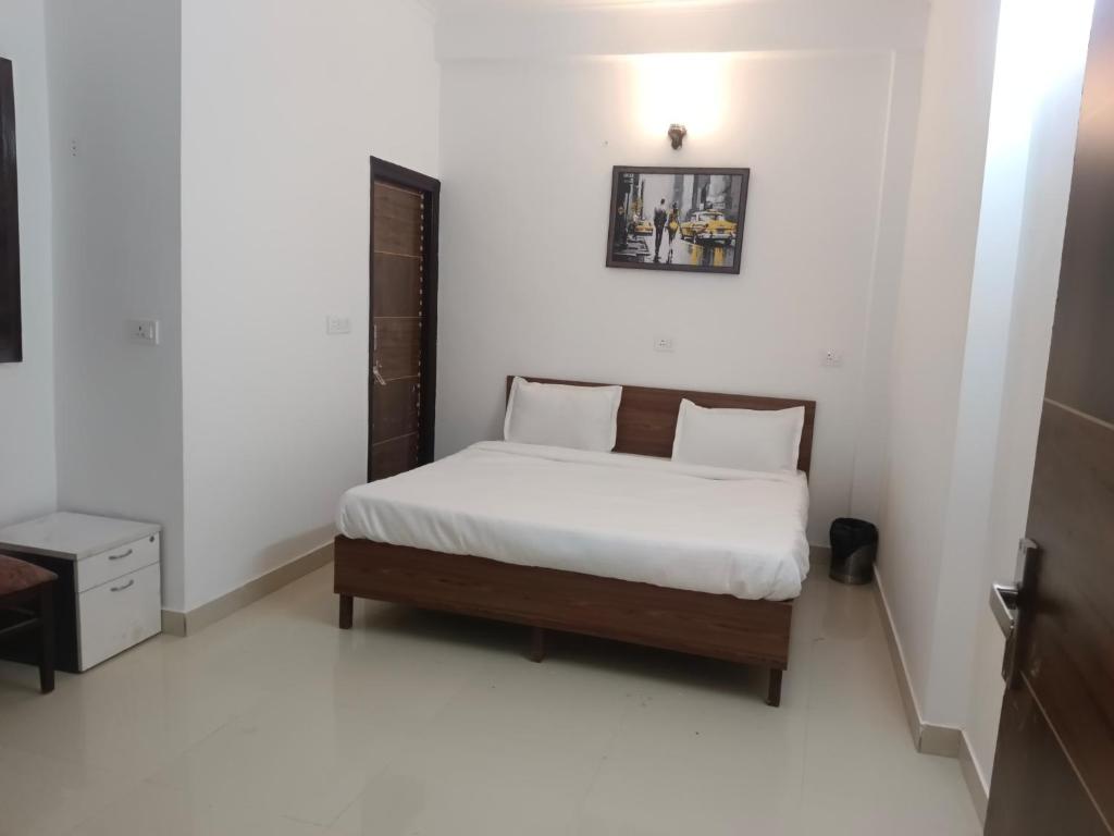 Postel nebo postele na pokoji v ubytování Dream Home