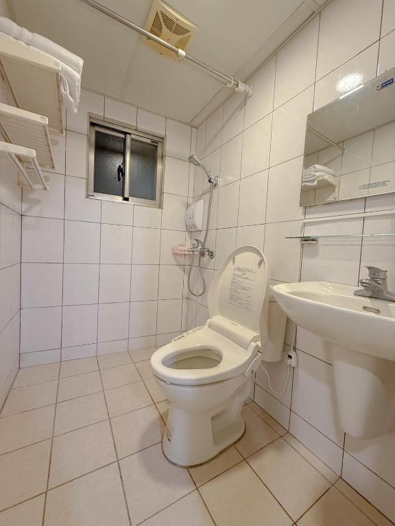 Koupelna v ubytování Tamshui Homestay