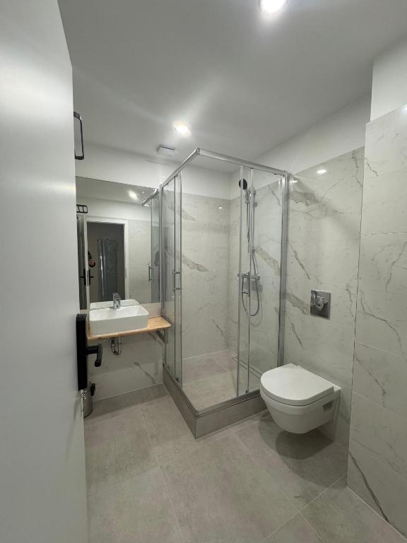 Koupelna v ubytování Promenaden Hotel