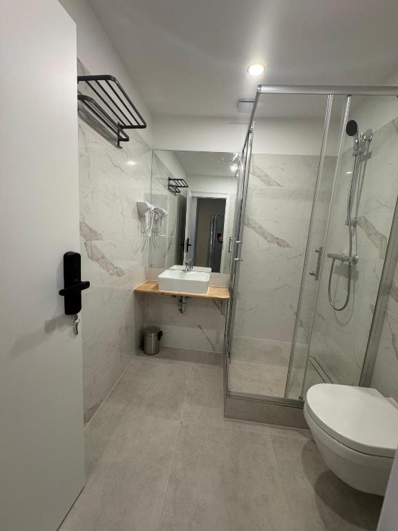 Koupelna v ubytování Promenaden Hotel