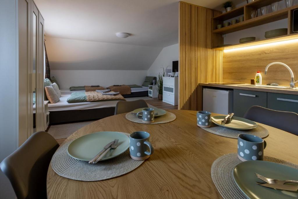 Postel nebo postele na pokoji v ubytování RP Apartmanház