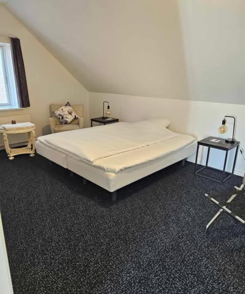 Postel nebo postele na pokoji v ubytování B&B Phønix