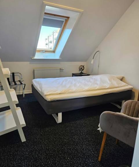 Postel nebo postele na pokoji v ubytování B&B Phønix