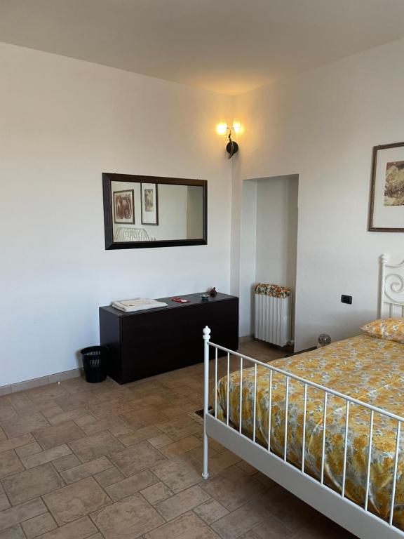 Postel nebo postele na pokoji v ubytování BeB cascina Mentirone