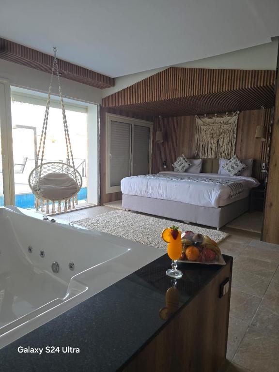 Postel nebo postele na pokoji v ubytování Panorama Bungalows Resort El Gouna