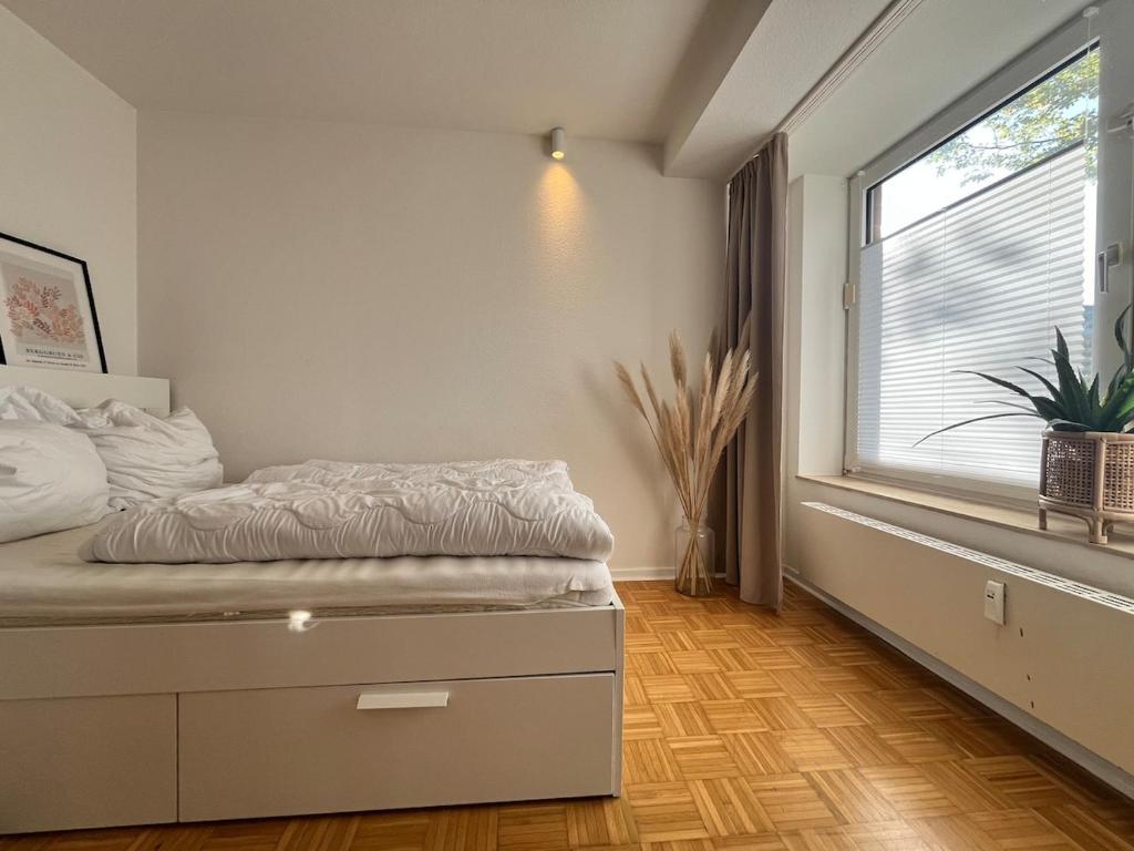 Postel nebo postele na pokoji v ubytování Modern Apartment - Am See
