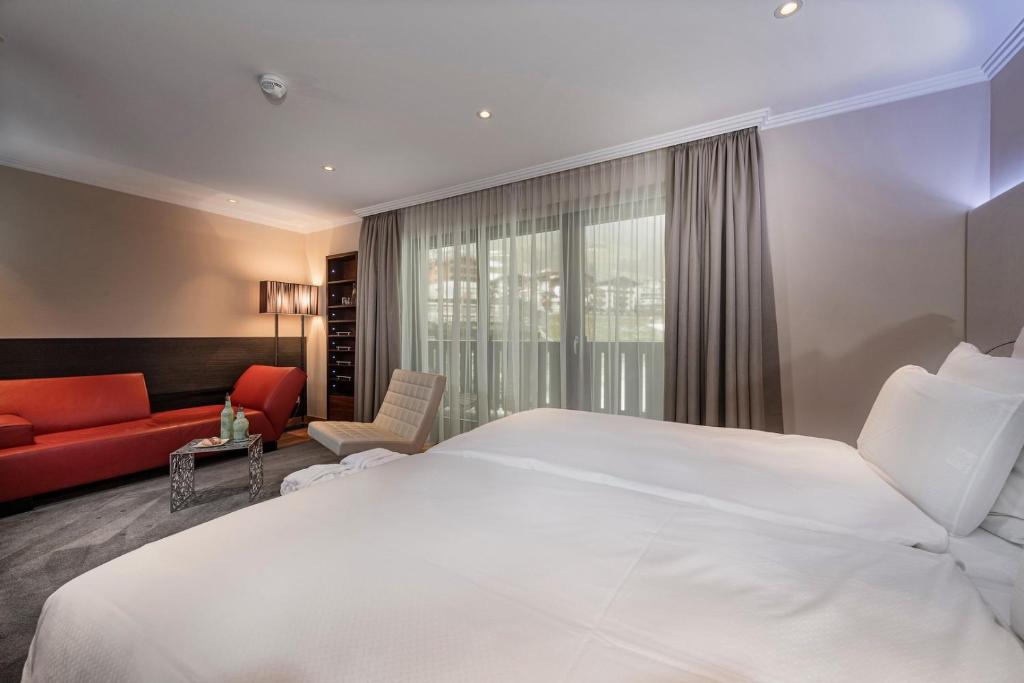 Posteľ alebo postele v izbe v ubytovaní Alpinresort ValSaa - Sport & Spa