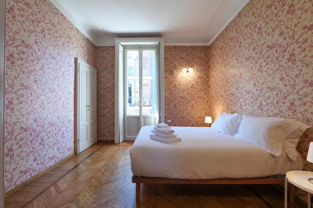 Łóżko lub łóżka w pokoju w obiekcie Villa Frascati with garden - City Life