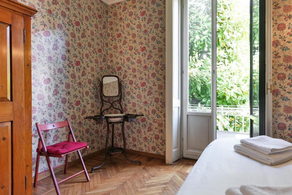 Łóżko lub łóżka w pokoju w obiekcie Villa Frascati with garden - City Life