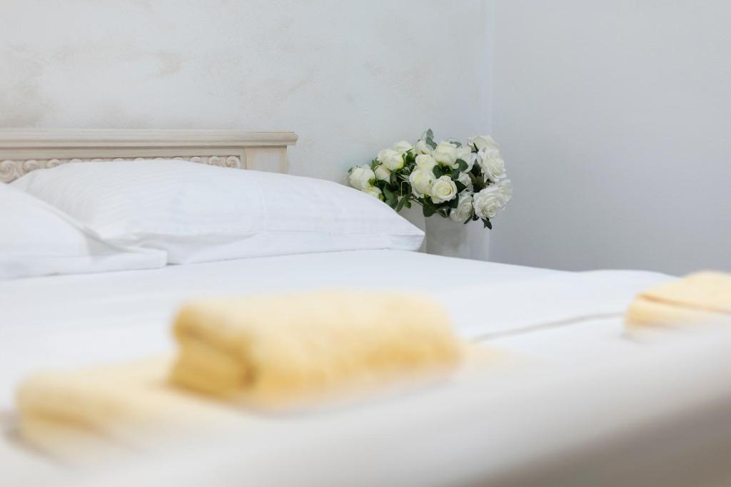 Posteľ alebo postele v izbe v ubytovaní Split Varos Inn