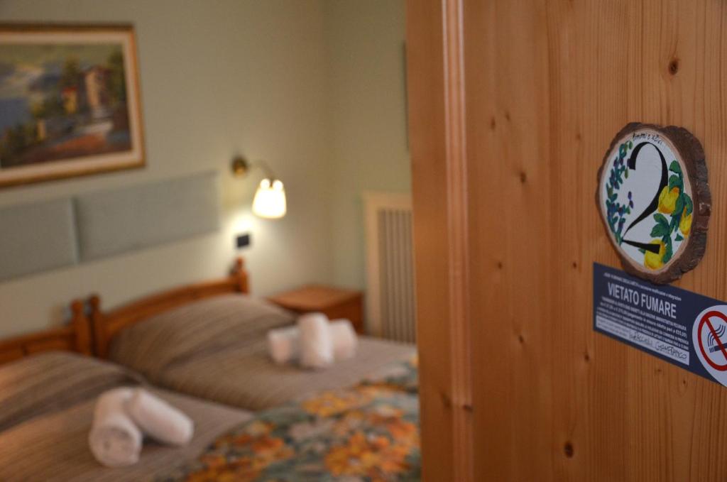Cama ou camas em um quarto em Affittacamere Porticciolo