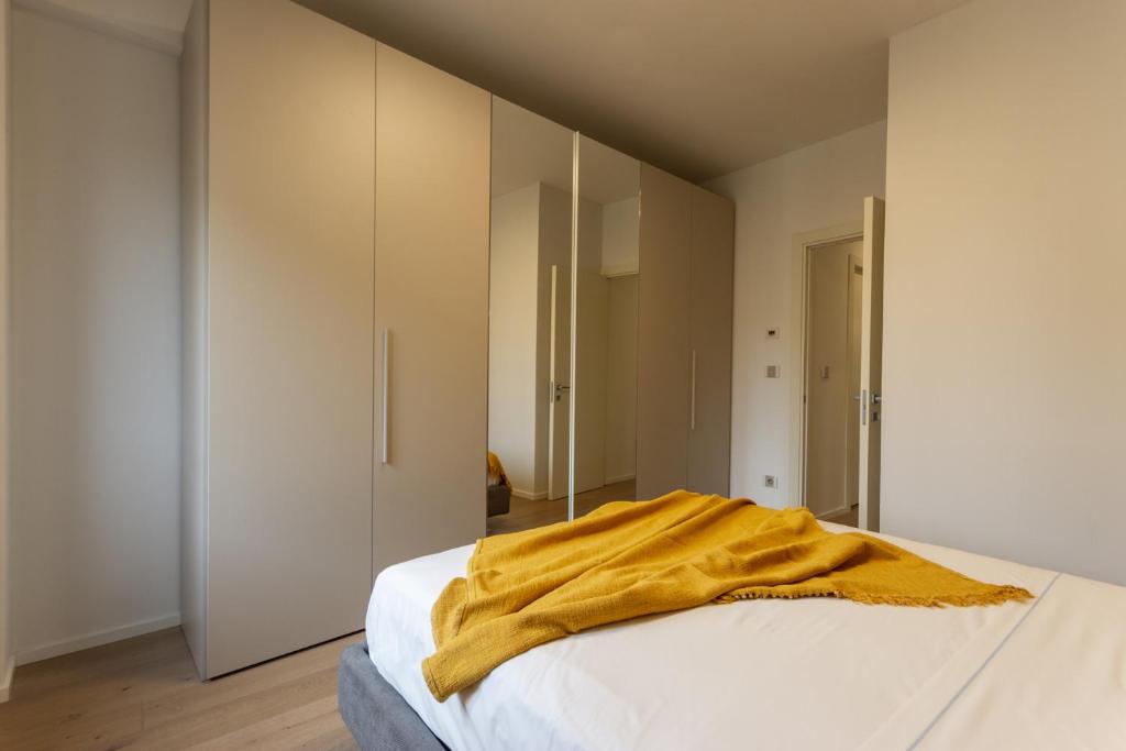Postel nebo postele na pokoji v ubytování Bianca Suite