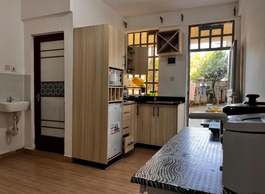 Kuchyň nebo kuchyňský kout v ubytování Jazby Guest House, Naivasha