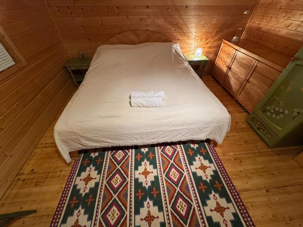 Postel nebo postele na pokoji v ubytování Ginkgo House