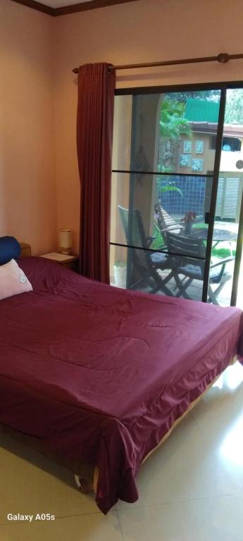 Postel nebo postele na pokoji v ubytování Nirvana Pool Villa 2