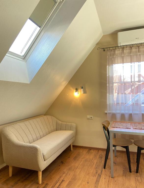 Posezení v ubytování Apartamentai Viktorija