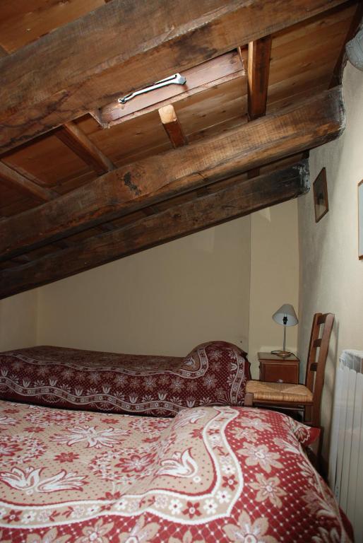 Letto o letti in una camera di Albergo Diffuso - Rocca Calascio