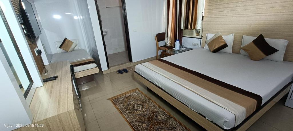 Cama o camas de una habitación en Hotel Su Shree Continental 5 Minutes Walk From New Delhi Railway Station