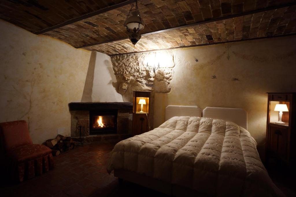 Letto o letti in una camera di Albergo Diffuso - Rocca Calascio