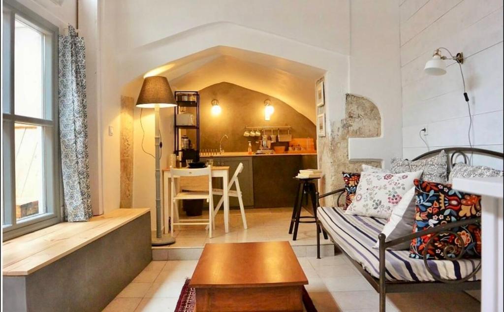 Ένα ή περισσότερα κρεβάτια σε δωμάτιο στο Casa Di Porto Vecchio