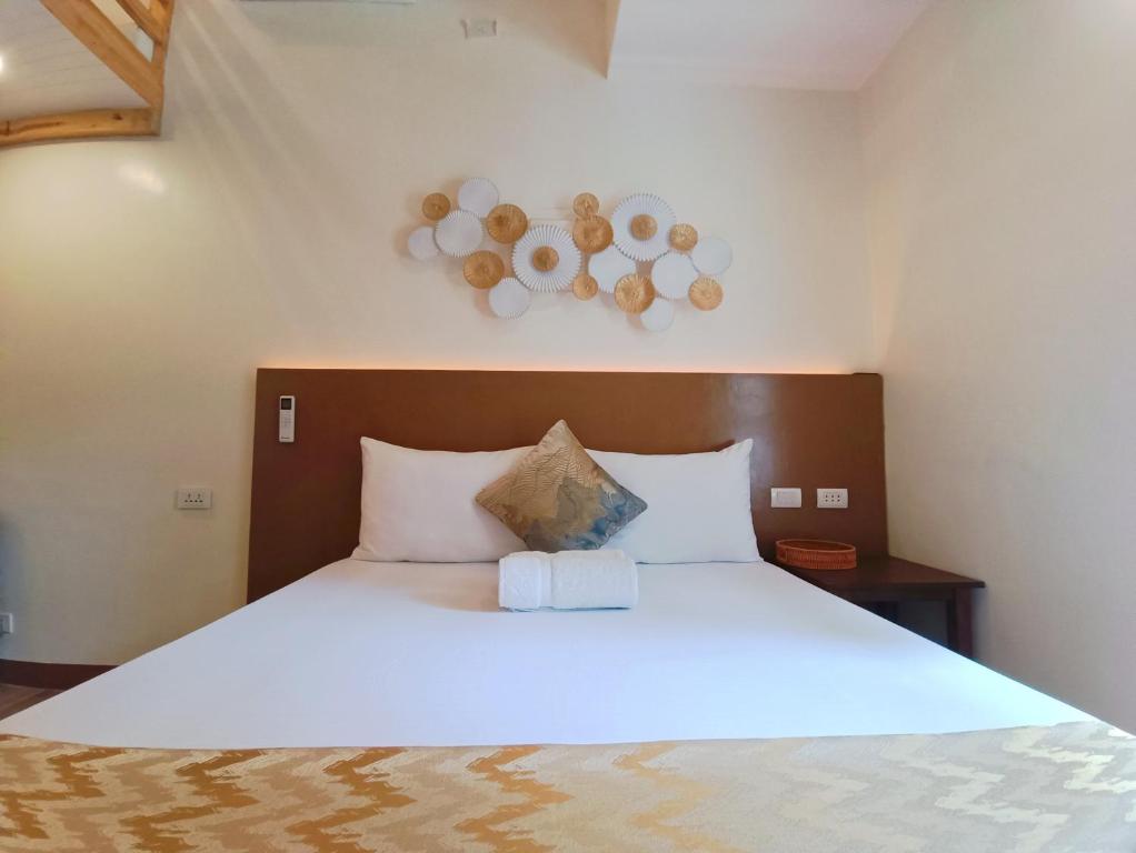 Postel nebo postele na pokoji v ubytování Kaimito House - Guest House near Mactan-Cebu Airport