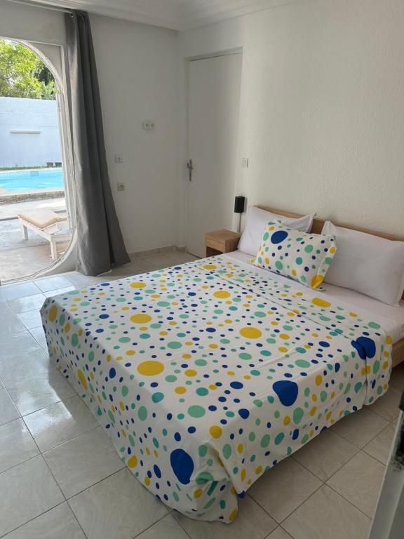 Postel nebo postele na pokoji v ubytování Maison Mimosa