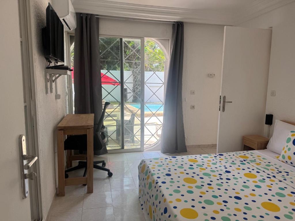 Postel nebo postele na pokoji v ubytování Maison Mimosa