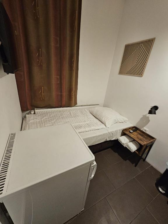 Postel nebo postele na pokoji v ubytování Hostel Sleep INN