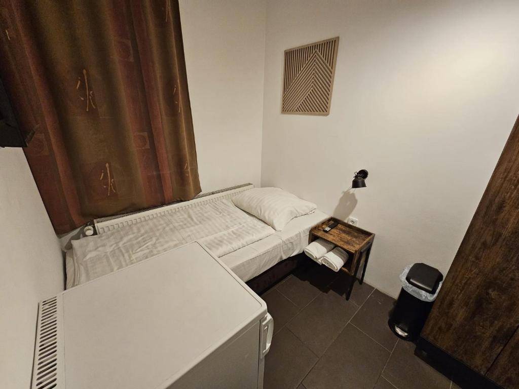 Postel nebo postele na pokoji v ubytování Hostel Sleep INN