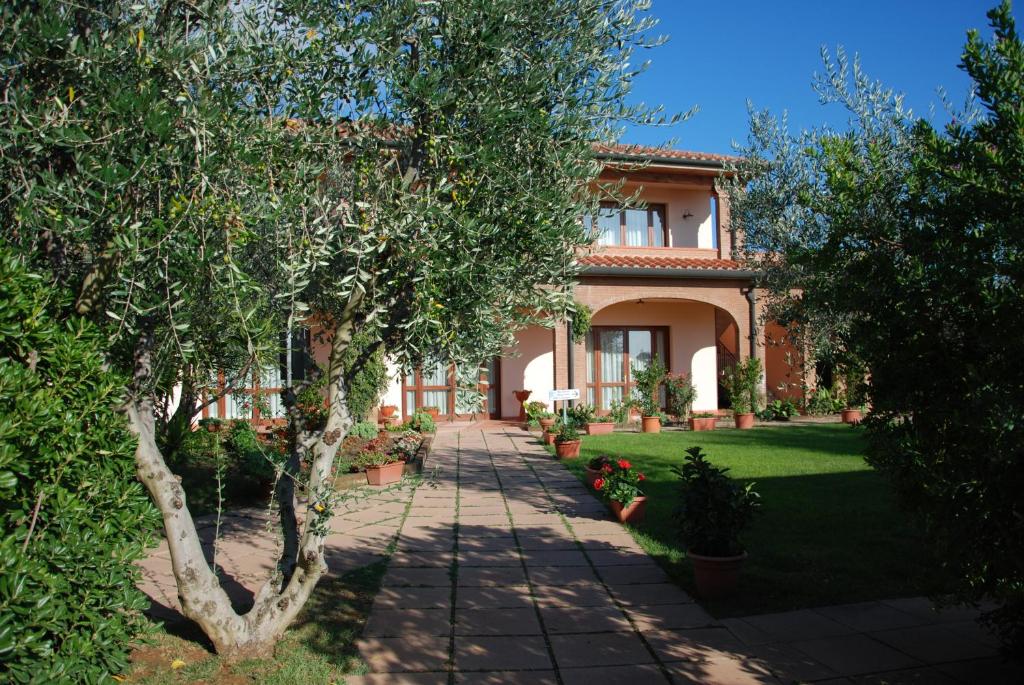 A garden outside Hotel Borgo degli Olivi
