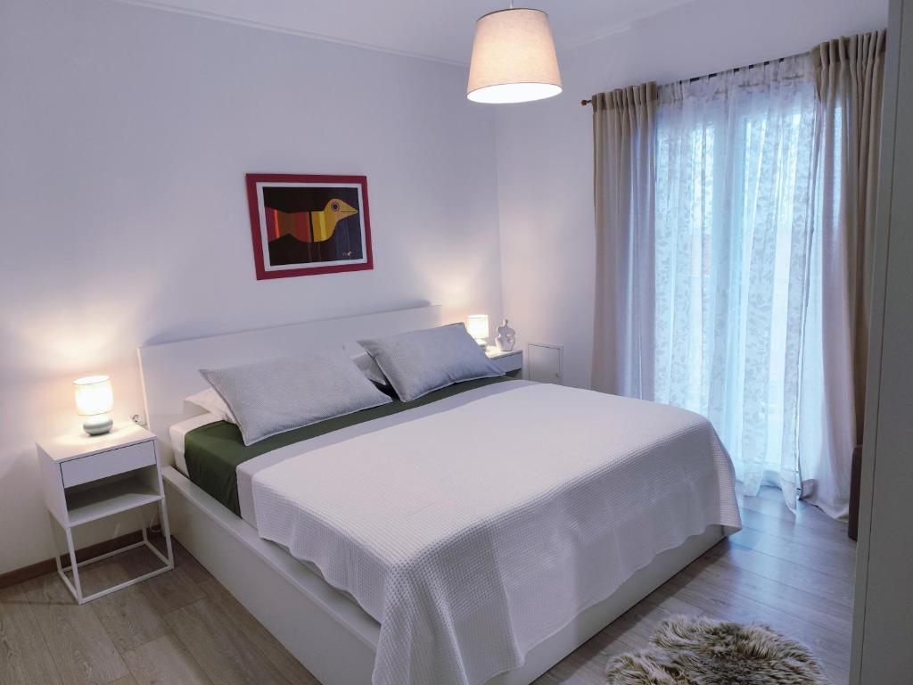 Posteľ alebo postele v izbe v ubytovaní Adriatic Sunny Apartments