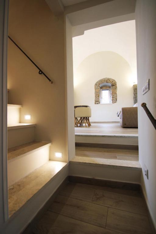 Postel nebo postele na pokoji v ubytování Tibur Parva - Intero Appartamento nel Borgo medievale