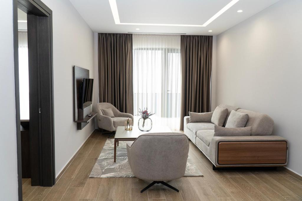 Posezení v ubytování Joelle Premium Hotel