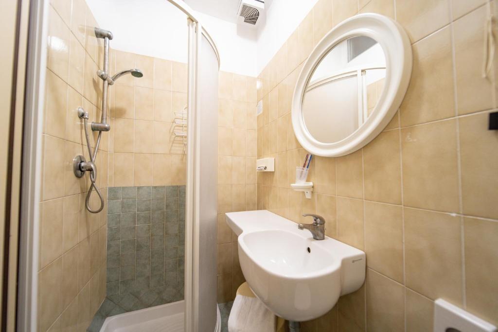 Koupelna v ubytování Hotel Cortina