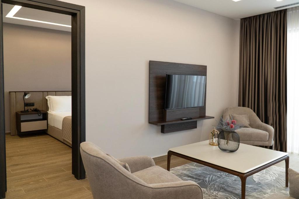 Posezení v ubytování Joelle Premium Hotel