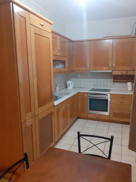 Dapur atau dapur kecil di Eleni's Apartment