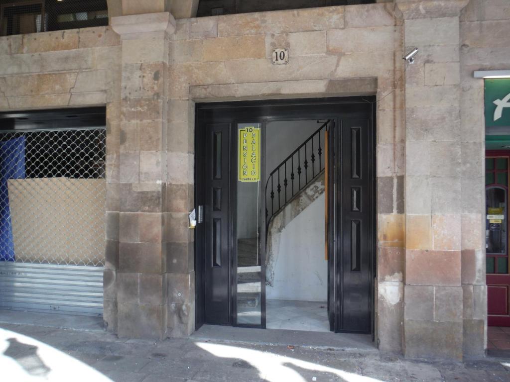 The facade or entrance of Pensión Palacio