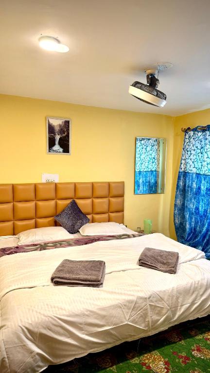 Postel nebo postele na pokoji v ubytování Al Hayat Guest House