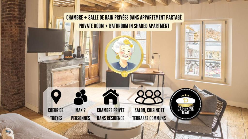 une chambre avec une table et une photo d'une femme dans l'établissement Suzanne 5 - Chambre Privée - Confort - Hypercentre, à Troyes