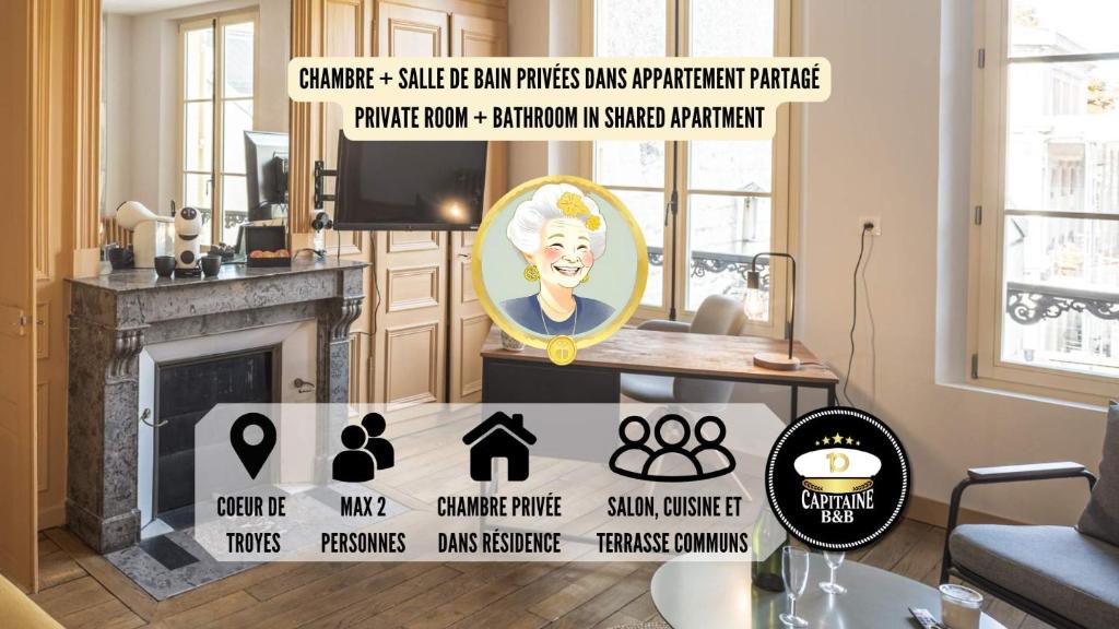un salon avec une table et une cheminée dans l'établissement Suzanne 3 - Chambre Privée - Confort - Hypercentre, à Troyes