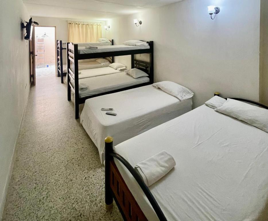 Postel nebo postele na pokoji v ubytování Hotel Casa Fátima