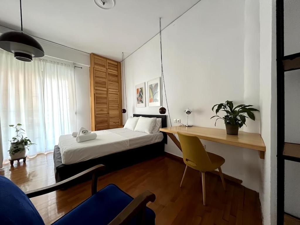 Postel nebo postele na pokoji v ubytování Lovely Studio Apartment