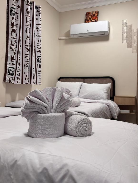 Letto o letti in una camera di The 5 Inn - Pyramids