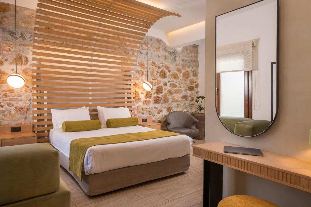 Łóżko lub łóżka w pokoju w obiekcie Agave Suites