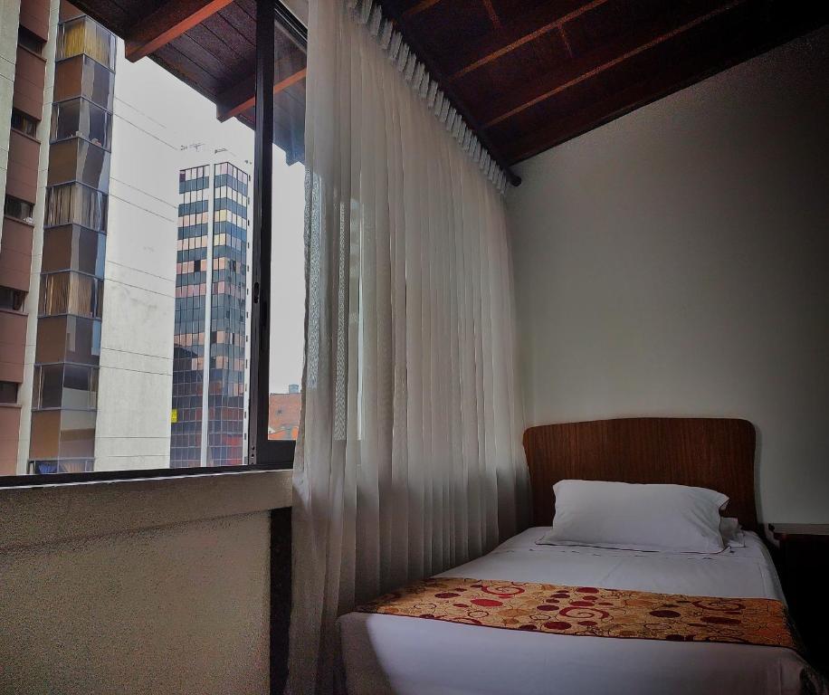 Postel nebo postele na pokoji v ubytování Gran Hotel
