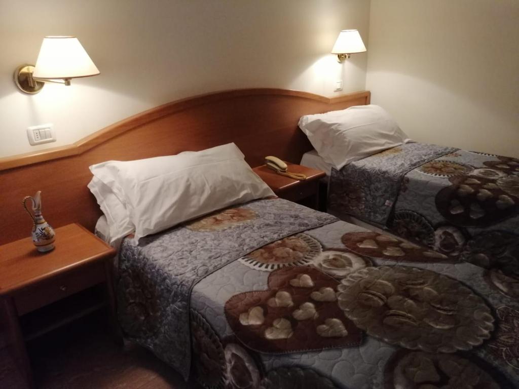 Postel nebo postele na pokoji v ubytování Scacco Matto